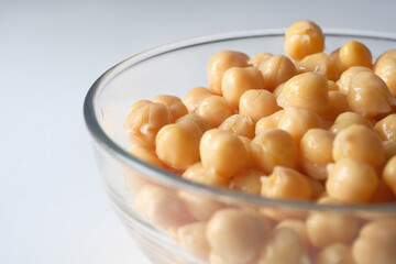 chick peas in a bowl on white background 