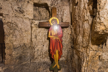 Jesus and cross in Prison of Christ. Monastery of the Praetorium in Jerusalem, Israel. The Greek...