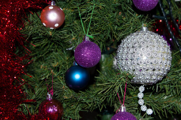 colourful balls as  decoration on christmas tree. selective focus