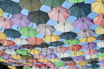 Fototapeta na wymiar Pastel Umbrellas in Laoag City