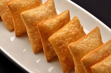 fried pastries served in a row