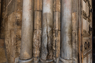 Old pillars of entrance to the Church left side of the Holy Sepulchre, also called the Church of...