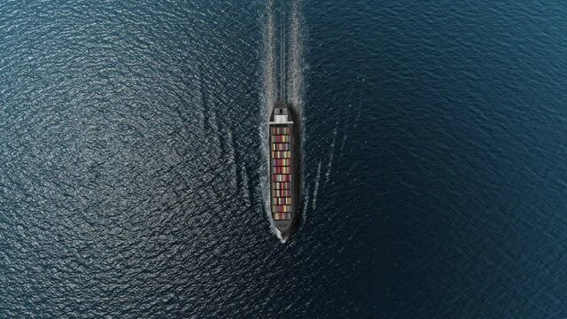 Cargo ship with containers in the open blue sea- Top down view 
, Freight Shipping export and import concept, container ship carries cargo across the ocean. Transportation. Delivery. Logistics.
