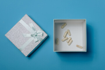 gift box with three good wish pills