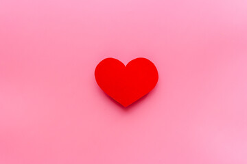Love concept. Heart made of red paper, top view