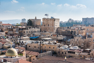 Fototapeta premium Aerial view of the old city of Jerusalem with The Tower of David in ancient Jerusalem Citadel, View from the Lutheran Church of the Redeemer.