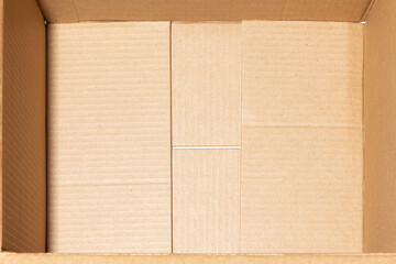 Empty open brown cardboard box