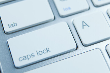 Computer keyboard and on the desk close up.