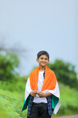 Cute little boy with Indian National Tricolor Flag