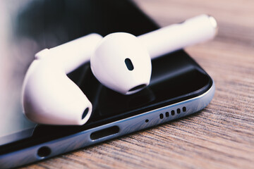 wireless earphone on phone