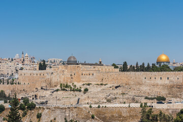 Dome of Al-Aqsa Mosque and golden dome of the Rock, built on top of the Temple Mount, known as...