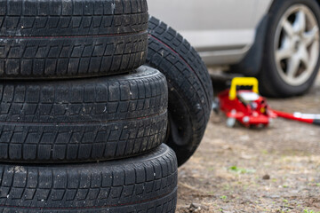 Vehicle tire repair and replacement equipment. Seasonal tire change.