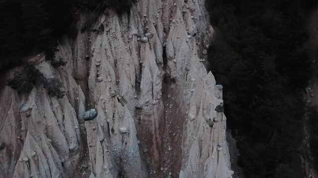 A drone flight over the pyramids in Percha, Dolomites in Italy