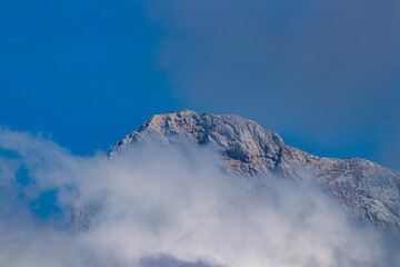 Triglav peak covered in fog	