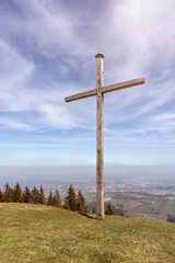 Summit cross on mountain Blomberg in Bavaria.