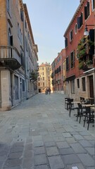 March 09, 2014: Facades of buildings on the Campo del Ghetto nuovo in the Ghetto district in Venice in Veneto, Ital