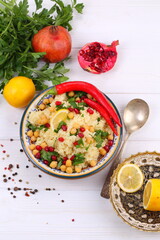 Eastern dish couscous with pomegranate and chickpeas