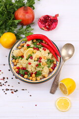 Eastern dish couscous with pomegranate and chickpeas