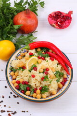 Eastern dish couscous with pomegranate and chickpeas