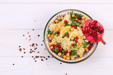 Eastern dish couscous with pomegranate and chickpeas