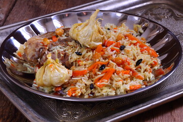 Uzbek lamb pilaf with pomegranate and tandyr flatbread