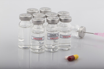 Covid-19 Corona Virus vaccine vials medicine drug bottles.