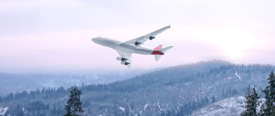 Fototapeta na wymiar Modern airplane flying over mountains, banner design