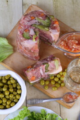 Festive table with turkey jelly and herring salad