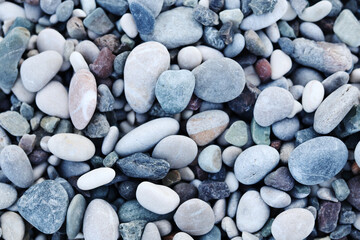 Fototapeta na wymiar Seastone texture, sea pebbles by the sea