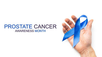 Prostate awareness. Blue ribbon in hands isolated on white background. Awareness prostate cancer of...