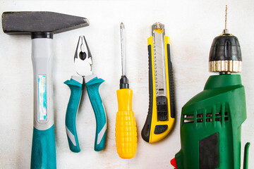 Building instrument set, tape measure, pliers, screwdriver, ruler, drill, hammer and utility knife