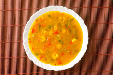 Pirão is a traditional dish of Brazilian cuisine made from cassava flour, fish or shrimp, on a...