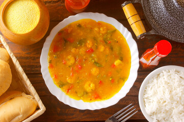 Pirão is a traditional dish of Brazilian cuisine made from cassava flour, fish or shrimp, on a...
