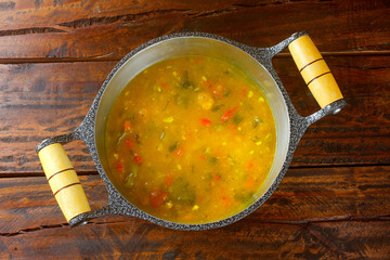 Pirão is a traditional dish of Brazilian cuisine made from cassava flour, fish or shrimp, in a pan...