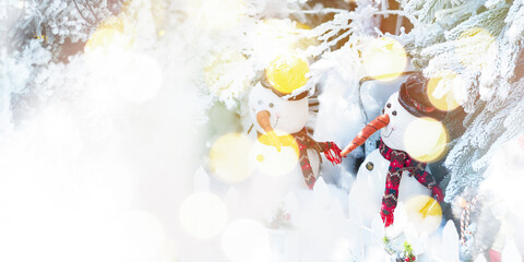 White snowman with smiling face and pine trees for Christmas background.