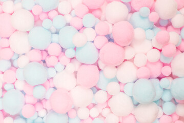 White, pink and blue soft pompons.