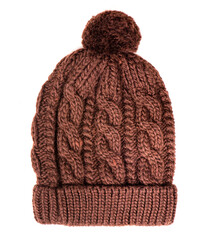 Knitted brown winter hat with pompom isolated on white background.