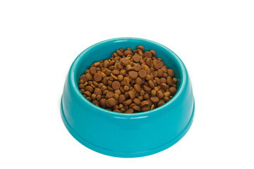 Cats and dogs dry food in the bowl isolated on white background.