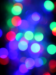 Colored lights spots on a black background