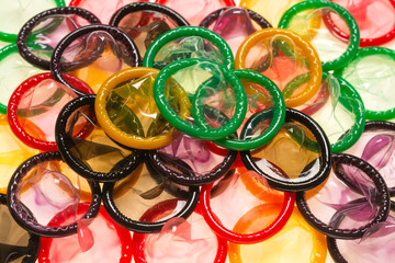 Colorful condoms background.