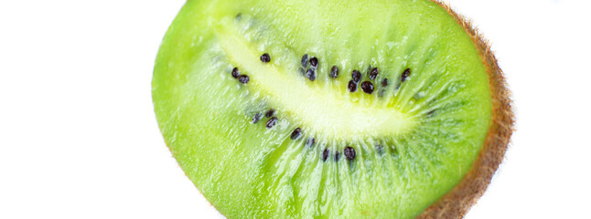 Close up photo of kiwi on white background. Kiwi fruit cut in half with seeds inside, macro view.
