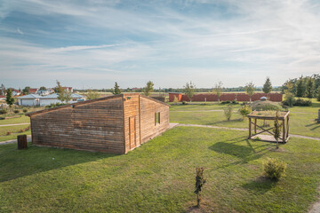 Garden park playground with lokout tower, maze labyrinth in background in Cerhenice town near Pecky, Czech republic.