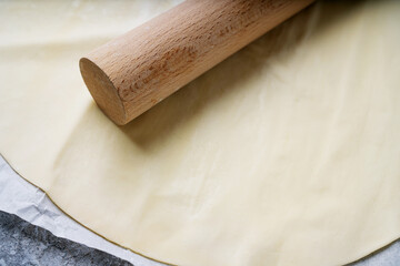 Ready to cook dough with a rolling pin
