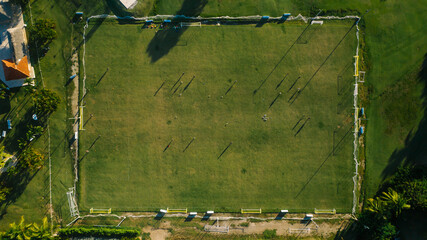Football field from above where people play football