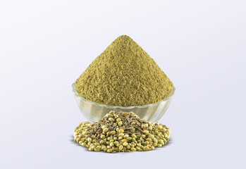 Coriander Powder (Dhaniya Powder) in a glass bowl with Coriander Seeds, Indian spices - Image.