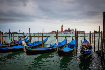 Traditional gondolas at the shore of Piazza San Marco in Venice, Venetian, Italy