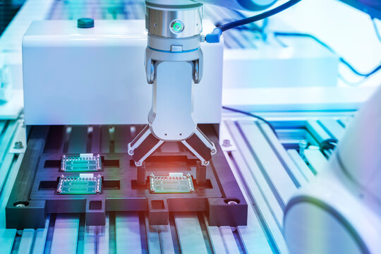 automatic robot for print circuit board (PCB)assembly machine part at factory