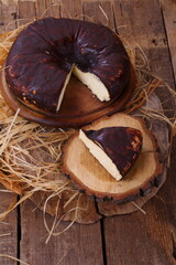 Cheese dry jack on a white wooden background with a cup of coffee
