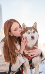 redhead girl and husky