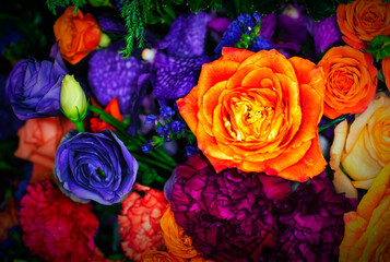 Fototapeta na wymiar Close-up of a mixed bouquet of roses,summer flowers background.